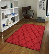 Modern red rug featuring embossed textured wave pattern